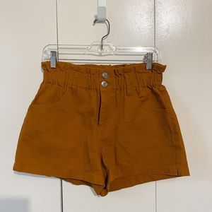 Burnt orange denim paper bag shorts